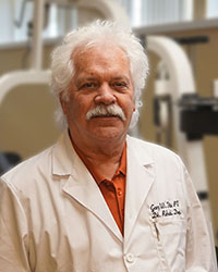 Gary Fite, Rehabilitation Director at Pershing Health System in Brookfield, Missouri, standing in the rehabilitation department.