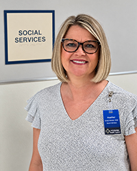 Heather Wood, BSW, Social Worker at Pershing Health System, standing near the Social Services office.
